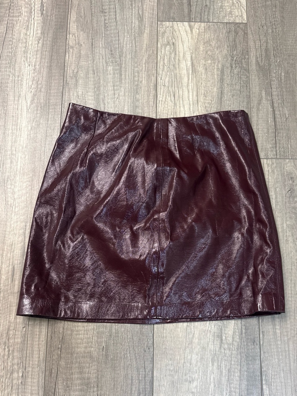 Blank NYC Glossy Wine Faux Leather Mini Skirt